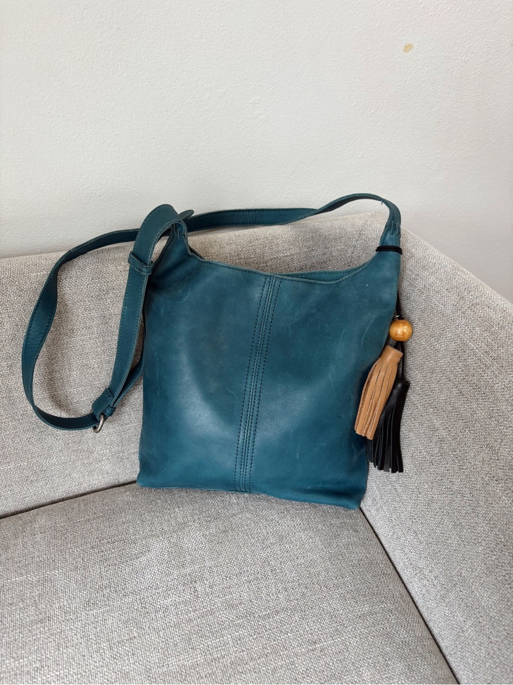 The Sak Huntley mini Teal Leather Crossbody Bag with Tassel